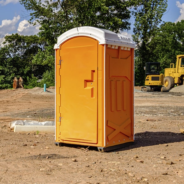 what is the cost difference between standard and deluxe portable restroom rentals in Bradford Iowa